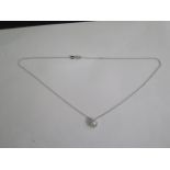 A 18ct white gold diamond and pearl pendant on an 18ct hallmarked gold chain, 40cm long, total