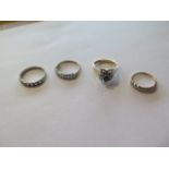 Four 9ct yellow gold rings, various sizes, approx 7.8 grams