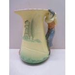 A Burleigh ware pottery jug, the handle moulded with a golfer, printed mark to base, 19.5cm high,
