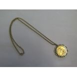 A George V gold full sovereign dated 1918 in a 9ct hallmarked pendant mount on a 9ct hallmarked