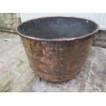 A 19th century copper log bin, 35cm tall x 49cm, wear consistent with age