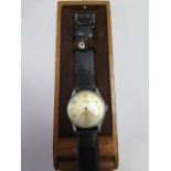 A 1950s Gents Omega manual wind wristwatch case 34mm wide with original box and outer box, some