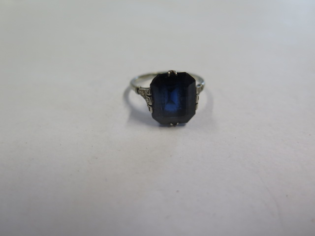 A dark blue sapphire and diamond white metal ring, the sapphire measures approx 11.5mm x 9.8mm x 5. - Image 2 of 3