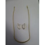 A 9ct gold necklace, 45cm long, marked 375, and a pair of hallmarked 9ct earrings 3cm long, total
