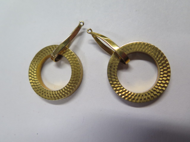 A pair of yellow gold earrings, missing hoops, testing to approx 14ct, 2.6cm diameter, approx 8.9