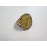 A George V gold half sovereign, dated 1914, in a hallmarked 9ct gold ring mount, size M, total