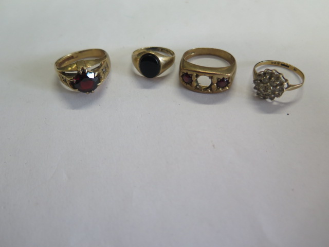 Four 9ct gold rings, one missing a stone, sizes J to S, total weight approx 16.4grams, some