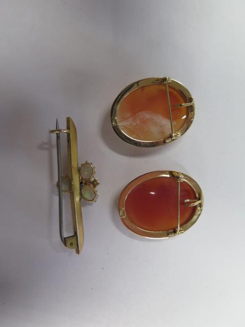 Two 14K gold cameo brooches, 3cm x 2.3cm, approx 6.9 grams, both good condition, and a 9ct opal - Image 2 of 2