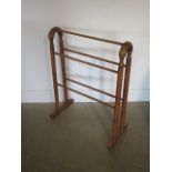 A late Victorian beech wood towel rail, 82cm tall x 65cm