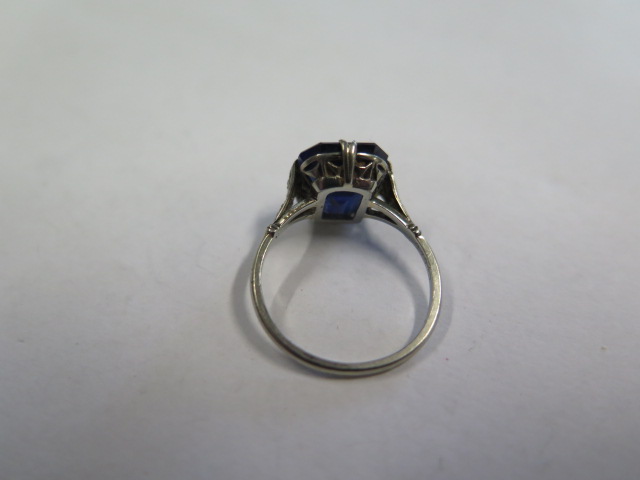 A dark blue sapphire and diamond white metal ring, the sapphire measures approx 11.5mm x 9.8mm x 5. - Image 3 of 3