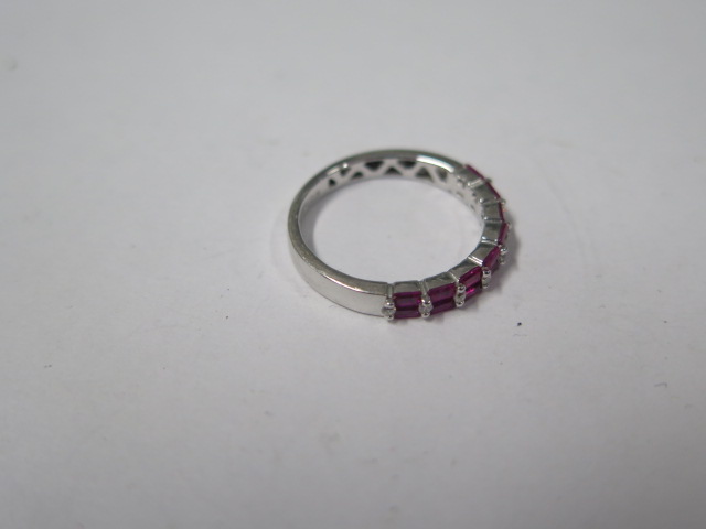 An 18ct white gold diamond and ruby 17 stone diamond ring, marked 750, ring size M, approx 2.8gs, in - Image 2 of 3