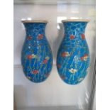 A pair of blue ground oriental style vases, 28cm tall, both good condition and both have crazing