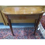 A Regency inlaid mahogany fold over card table, 74cm tall x 91cm, 44cm when closed