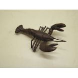 A bronze lobster, 9cm long, in good condition