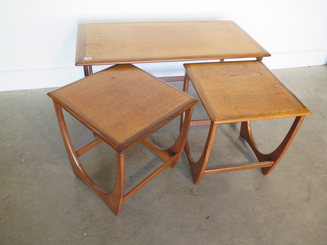 A nest of three G plan side tables, 51cm tall x 99cm x 49cm, in generally good condition with some