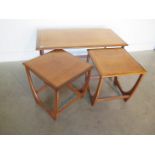 A nest of three G plan side tables, 51cm tall x 99cm x 49cm, in generally good condition with some