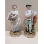 A pair of continental porcelain figures, early 20th century, modelled as gallant and flower seller