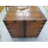 A 19th century silver chest with key and metal banding and fitted interior, missing its top tray,