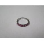 An 18ct white gold diamond and ruby 17 stone diamond ring, marked 750, ring size M, approx 2.8gs, in