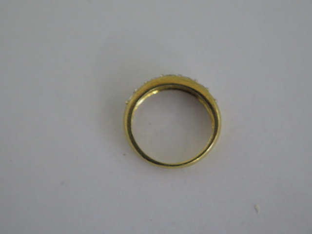 An 18ct hallmarked yellow gold seven stone diamond ring, total ct 1.00, ring size N, approx 4.4 - Image 4 of 4