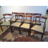 A set of eight early 19th century mahogany bar back dining chairs, including two carvers with