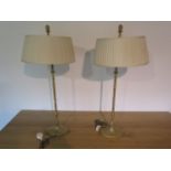 A pair of metal table lamps with shades, 80cm tall