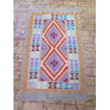 A new hand knotted woollen Chobi Kilim rug, 1.28m x 0.8m