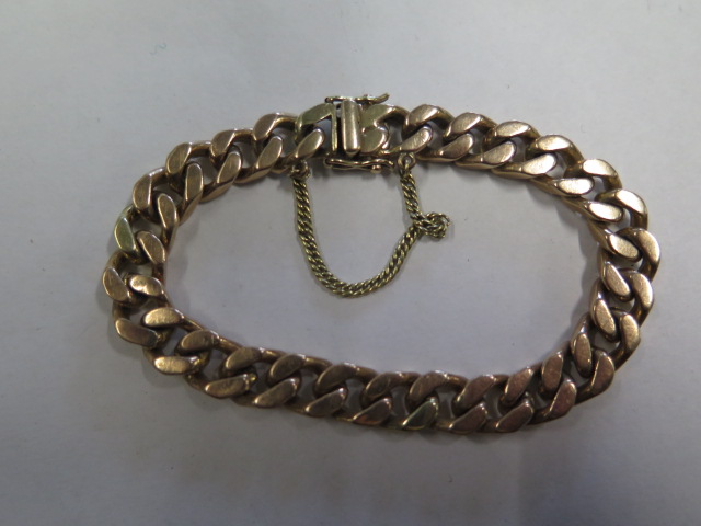 A hallmarked 9ct yellow gold link bracelet approx 20cm long, total weight 59 grams with some wear