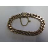 A hallmarked 9ct yellow gold link bracelet approx 20cm long, total weight 59 grams with some wear