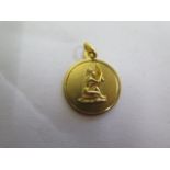 An 18ct yellow gold pendant 2.2cm diameter, approx 4.7 grams, in good condition, marked 750