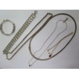 A group of white metal and silver necklaces and bracelets, various marks (6) and a 9ct gold chain