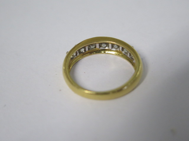 An 18ct hallmarked yellow gold seven stone diamond ring, total ct 1.00, ring size N, approx 4.4 - Image 3 of 4