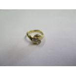 A hallmarked 18ct yellow gold diamond crossover ring, diamonds approx 0.20ct each, size K, approx