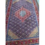 A hand knotted woolen Bijar rug,3.25m x 2.06m