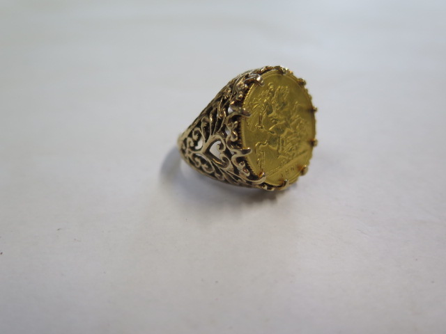 A George V gold half sovereign, dated 1908, in a hallmarked 9ct gold ring mount, size N, approx 9.