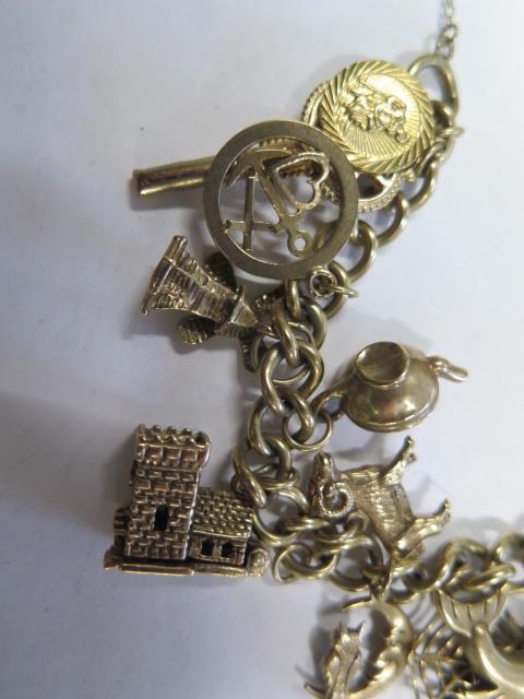 A 9ct gold charm bracelet with 20 assorted charms, bracelet approx 20cm long, total weight approx - Image 2 of 3