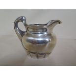A Danish silver jug dated 1902, 10cm tall, approx 6.3 troy oz, generally good with some usage marks