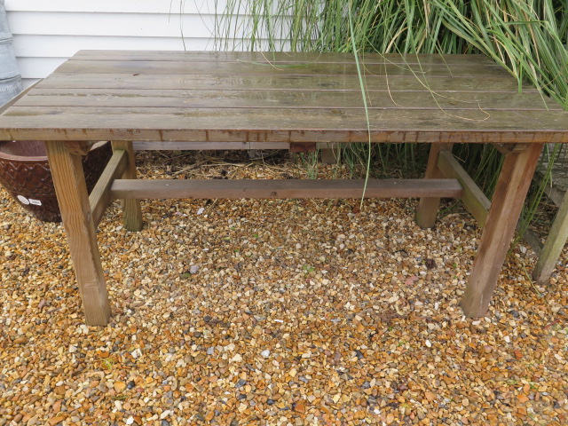 A garden potting table, 160cm wide x 76 x 76cm high