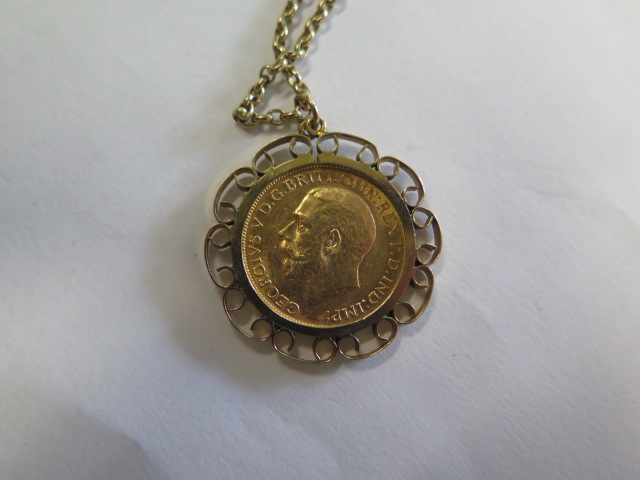 A George V gold full sovereign dated 1918 in a 9ct hallmarked pendant mount on a 9ct hallmarked - Image 3 of 3