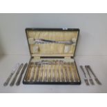 A boxed silver handle six setting fish cutlery set with six odd silver handled knives and forks