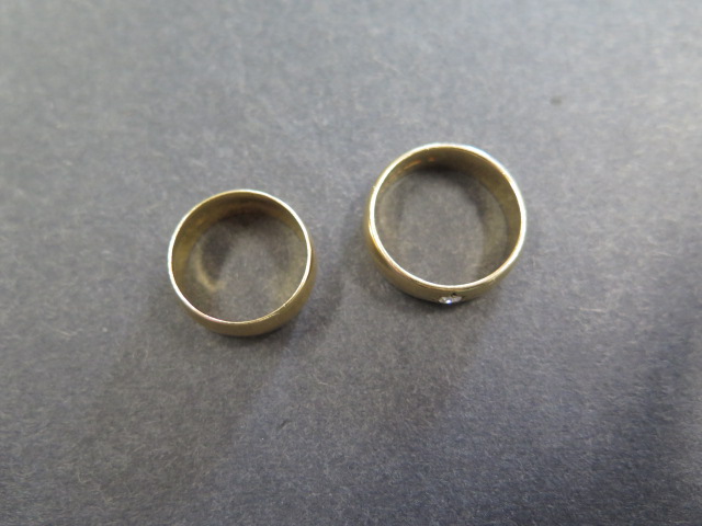 An 18ct gold hallmarked band ring, size L, approx 5.7 grams and a 9ct gold hallmarked band ring - Image 2 of 2