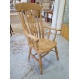 A Victorian style beechwood grandfather chair, 115cm tall