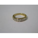 An 18ct hallmarked yellow gold seven stone diamond ring, total ct 1.00, ring size N, approx 4.4