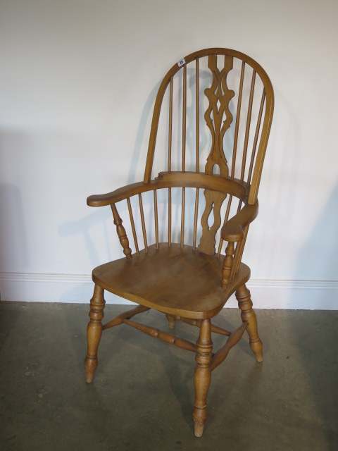 A Victorian style hoop back ash and elm elbow chair, 122cm tall x 64cm wide