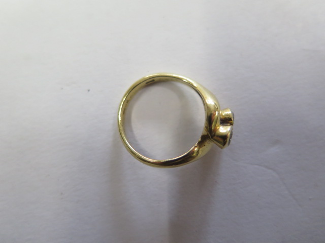 A hallmarked 18ct yellow gold diamond crossover ring, diamonds approx 0.20ct each, size K, approx - Image 3 of 3