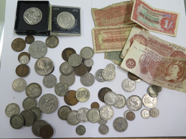 A collection of assorted banknotes and coinage