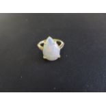 A silver gilt opal pear shaped ring, size J/K, opal approx 17mm x 11mm x4mm, in good condition