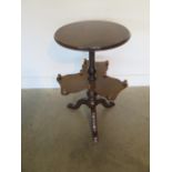 A pretty walnut side table with revolving centre tier on a tripod base, 74cm tall x 43cm diameter