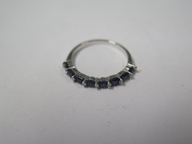 An 18ct white gold blue sapphire and diamond 17 stone ring marked 750, size N, approx 2gs, in good