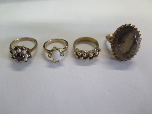 Four 9ct gold rings, sizes K, M, O approx total weight 23.8 grams, some usage marks but reasonably